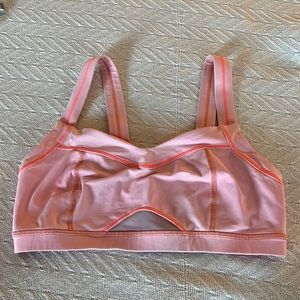 Lululemon sports bra. Light pink with hot pink stitching. Size S.